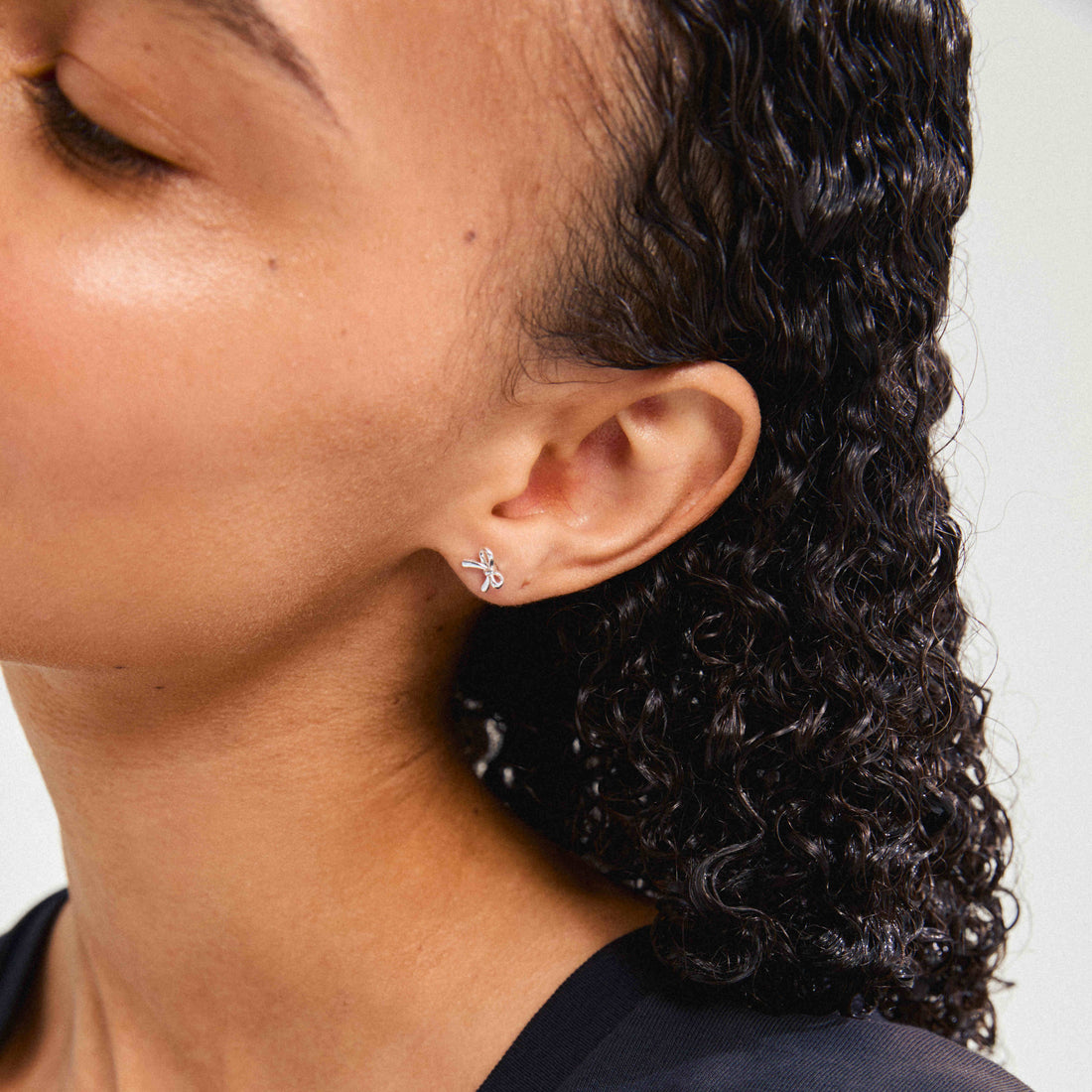 LYSANDRA recycled micro bow earrings